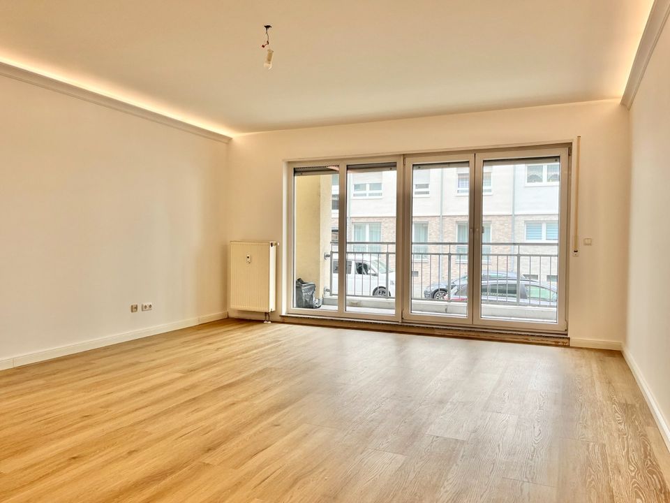 Sanierte Familienwohnung: 4-Zimmer-Hochparterre mit Loggia in Frankfurt am Main