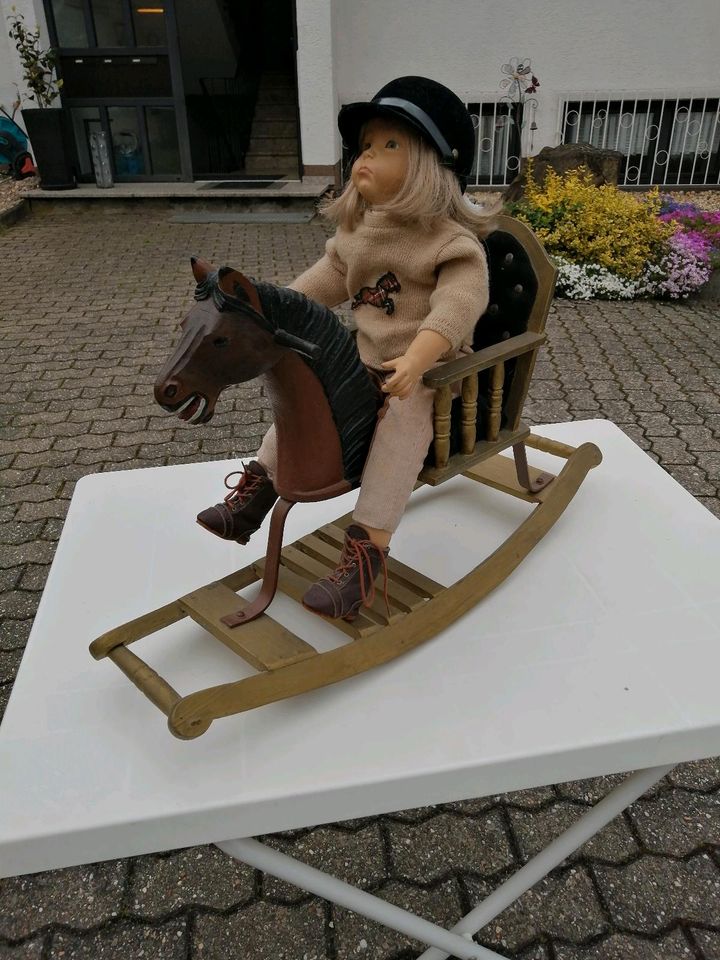 Puppe mit Schaukelpferd in Koblenz