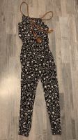 Damen Jumpsuit Overall Federn schwarz braun Größe S Hessen - Hainburg Vorschau