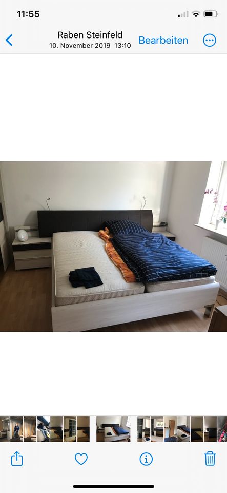 Schlafzimmer mit Bett und Schrank in Raben Steinfeld