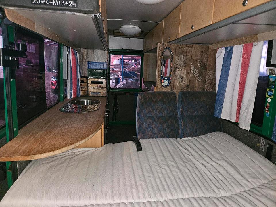 Wohnmobil Mercedes MB711 d Camper mit Dachzelt für 6 Personen in Süderholz