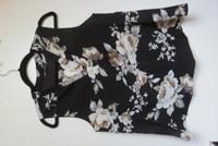Oberteil / Bluse mit Blumen Gr. 34 Kreis Ostholstein - Bad Schwartau Vorschau