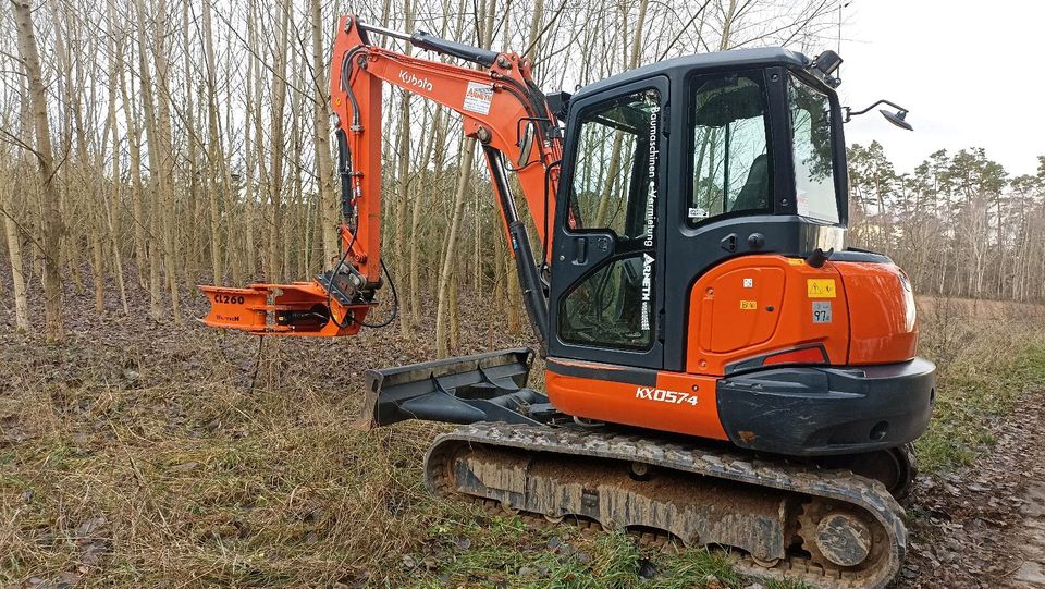 Bagger mieten mit Kegelspalter oder Fällgreifer in Plankenfels