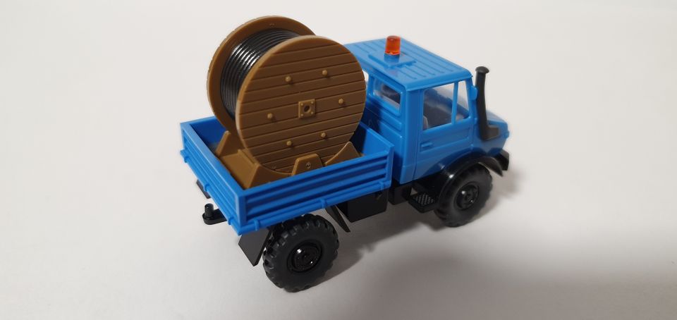 1:87 WIKING Lkw WERBEMODELL Mercedes UNIMOG SCHLESWAG in Heide