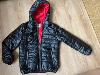 Neuwertige warme Steppjacke schwarz rot Gr. 134/140 Brandenburg - Potsdam Vorschau