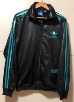 Adidas Chile 62 Herren/Damen Jacke Größe M_L Schwarz mit 3Streife Berlin - Hohenschönhausen Vorschau