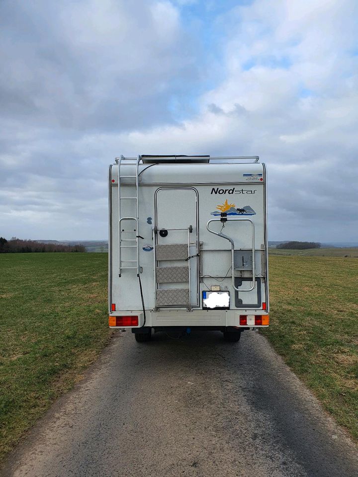 Nissan Navarra D40 mit Nordstar Camp 8L WOKA in Mörsbach