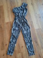 Schwarz-weißer One-Shoulder Overall Bayern - Leipheim Vorschau