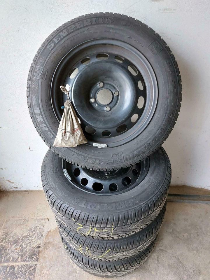 Kompleträder Winterreifen Peugeot 215/60R16 99H 6mm in Detmold