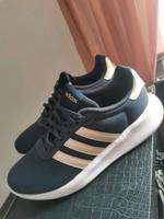 Adidas Schuhe blau/gold Niedersachsen - Cuxhaven Vorschau