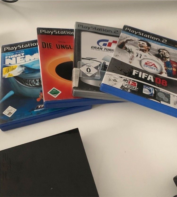 PlayStation 2 Slim mit spielen und allem Zubehör in Berlin