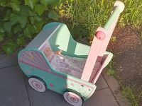 Holzpuppenwagen / Lauflernwagen Holz mit Bettzeug/Kissen u.Puppe Bochum - Bochum-Ost Vorschau