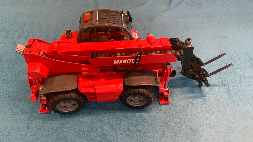 Bruder Manitou MRT 2150 Spielzeug Teleskopstapler in Kaltwasser