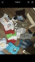 (14) großes Paket Babysachen Gr. 74 Deutschland-Shirt Köln - Worringen Vorschau