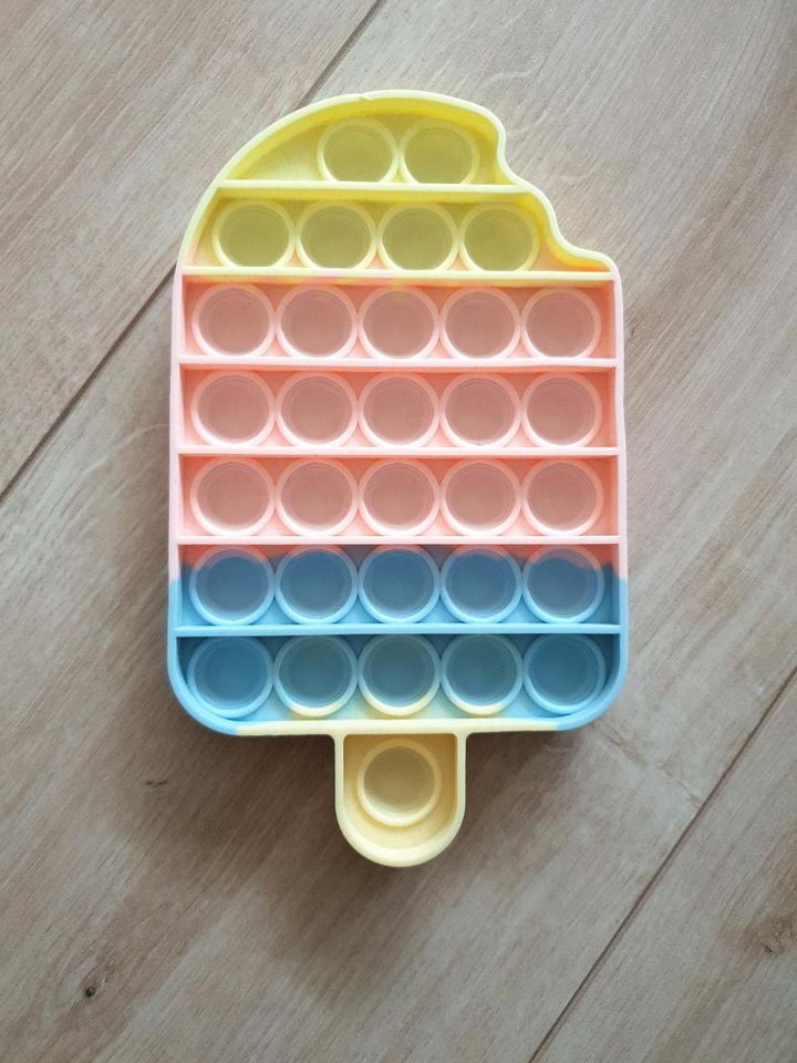 Pop it Plopper Spielzeug Eis Alphabet in Quickborn