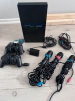 PlayStation 2 inkl. 7 Spiele und 3 Mikros Niedersachsen - Weyhe Vorschau