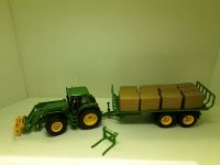 Siku Traktor John Deere Frontlader m.Heuballenanhänger 1/32 gebr. Bochum - Bochum-Wattenscheid Vorschau