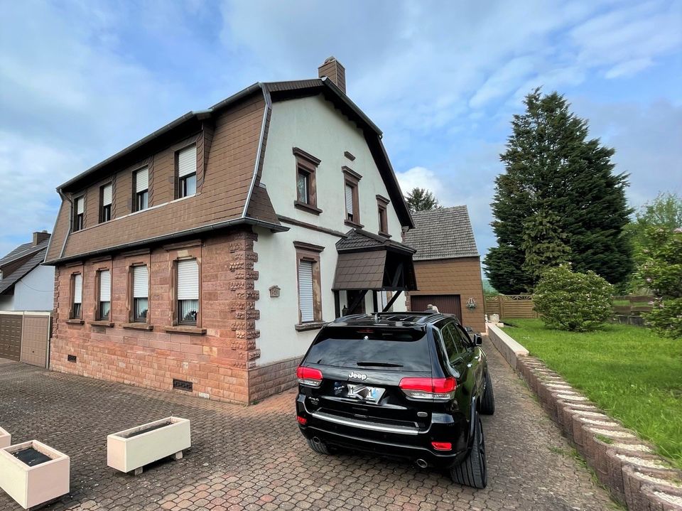 2-Familienhaus *freistehend* mit großem Garten und Garage in Riegelsberg