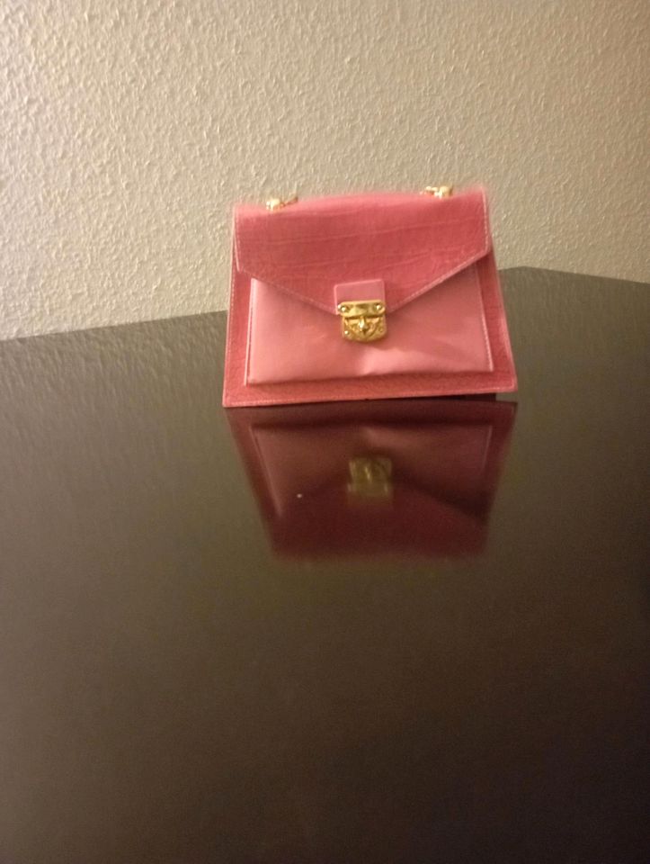 Handtasche pink- gold in Bielefeld