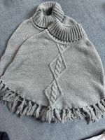 Poncho grau Glitzer Größe134/152 Niedersachsen - Coppenbrügge Vorschau