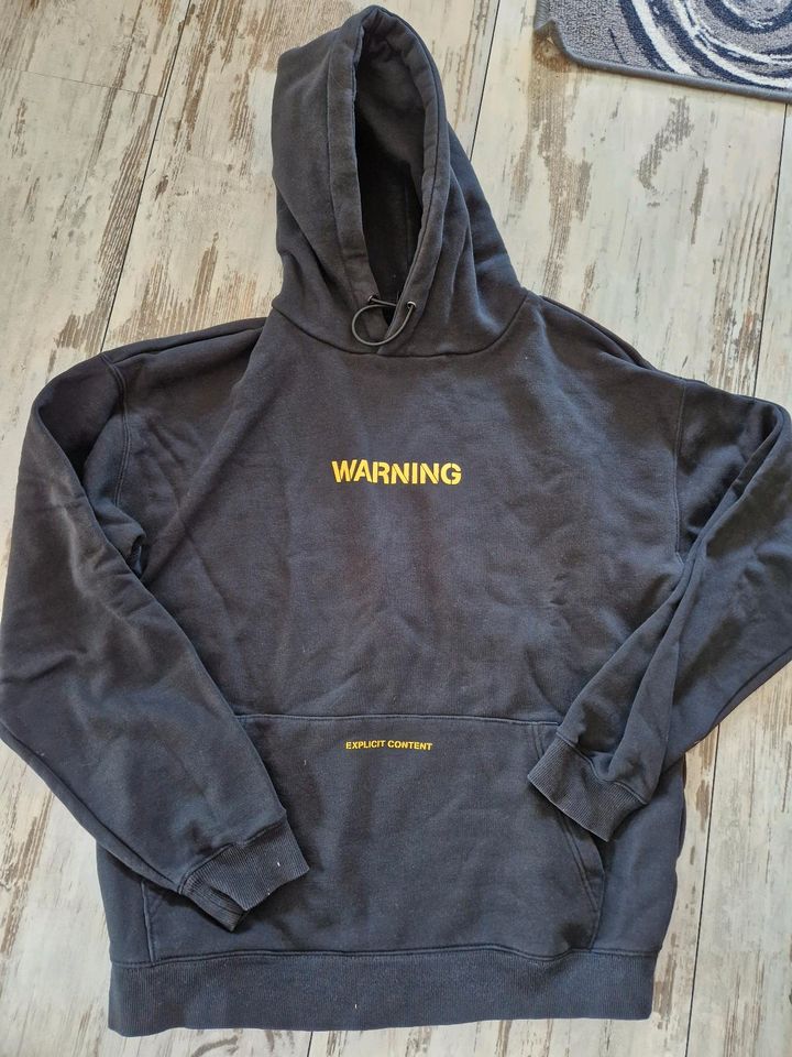 Hoodie schwarz "Warning" 158 164 in Nörten-Hardenberg