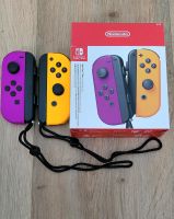 Nintendo Switch Controller Joy Con Paar Neon Lila Orange Sachsen-Anhalt - Sangerhausen Vorschau