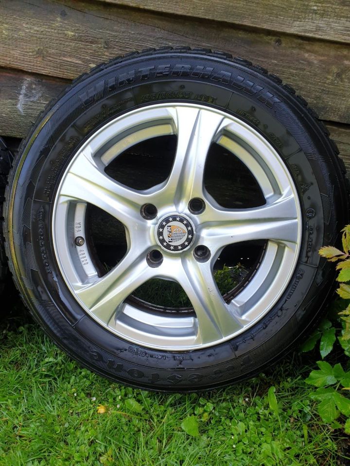 Platin Alu Felgen DMS08 15 Zoll Firestone Reifen in Niebüll