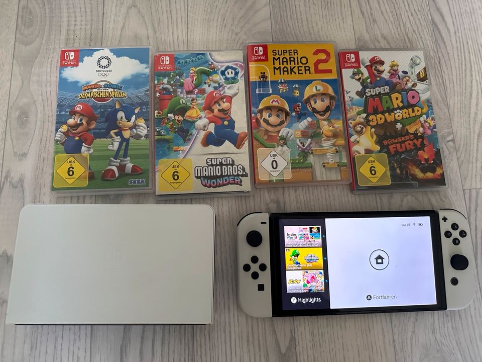 Nintendo Switch OLED + 2 Controller + 4 Spiele in Köln