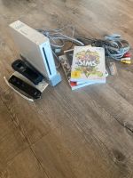Wii Konsole mit drei Spielen, Controller und allen Kabeln Berlin - Köpenick Vorschau