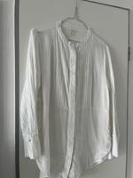 H&M Bluse mit seitlicher Knopfleiste Biesen M 38 weiß top Zustand Sachsen-Anhalt - Biederitz Vorschau