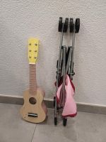 Spielzeug gitarre und puppenwagen Baden-Württemberg - Schwaigern Vorschau