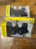 PlayStation Dual Shock 2 Controller 2 Stück Neu Original Verpackt Niedersachsen - Salzbergen Vorschau