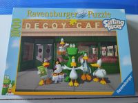 Puzzle 1000 Teile "Decoy Cafe", Sitting Ducks, Ravensburger ca 70 Baden-Württemberg - Gäufelden Vorschau