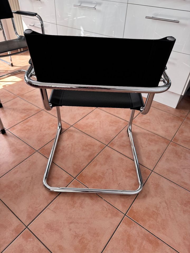 5 schwarze Freischwinger Stühle mit Kippschutz Komplettpreis in Freising