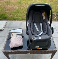 Maxi Cosi Babyschale mit Basisstation (Isofix) und Zubehör Auto Hessen - Karben Vorschau