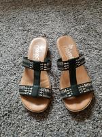 Rieker Antistress Sandalen Pantoletten schwarz silber Gr. 36 Niedersachsen - Wedemark Vorschau