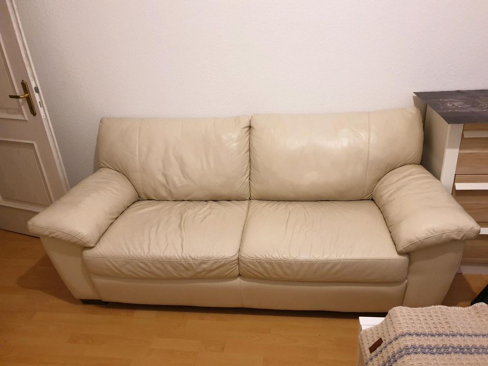 Ledersofa und einen Sessel in Leipzig