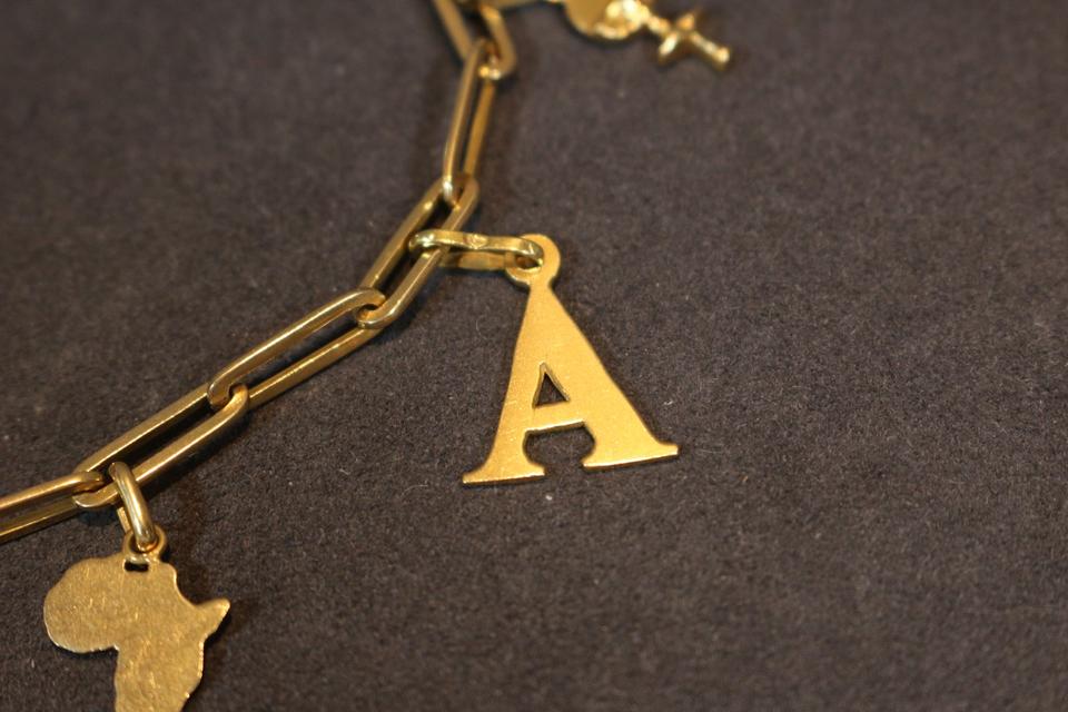 Armband Bettelarmband mit Anhängern / 333er / 585er / 750er Gold in Düsseldorf