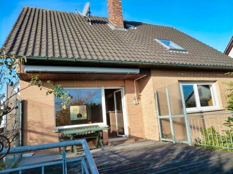 Familienfreundliches Zuhause in Sylbach... Wohnhaus mit robuster Klinkerfassade, Garage, großer Terrasse und sonnigem Garten in Haßfurt