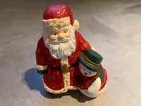 Deko Weihnachtsdeko Figur Weihnachtsmann mit Schneemann rot Nordrhein-Westfalen - Korschenbroich Vorschau