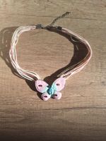 Halskette mit Schmetterlingsanhänger | rosa-hellblau Bayern - Moosburg a.d. Isar Vorschau