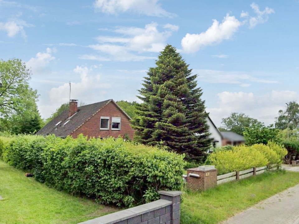 Familiengerechtes Einfamilienhaus mit Einliegerwohnung und großem Garten in Buchholz (Dithm)