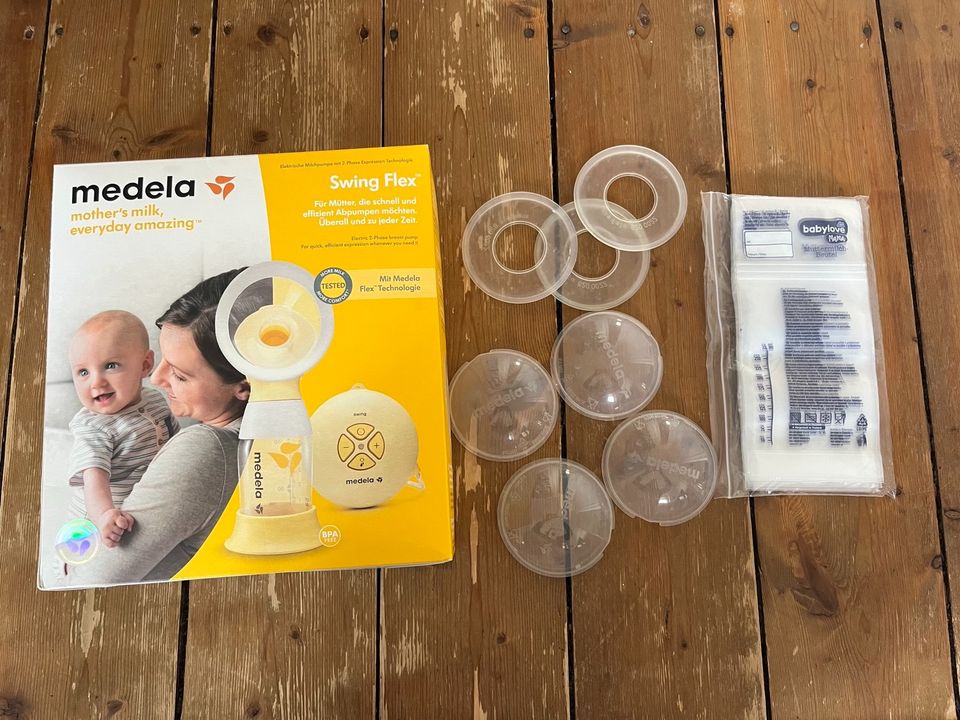 Medela Swing Flex elektrische Milchpumpe mit Zubehör in Gießen