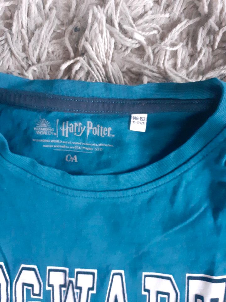 2 Harry Potter Hogwarts T Shirts 146/152 H&M blau C&A petrol wNE in Velbert
