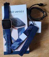 Fitbit Versa 2 Fitnessuhr mit zwei Armbändern Schleswig-Holstein - Seedorf Vorschau