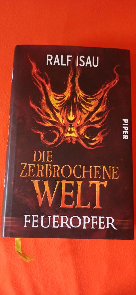 Die zerbrochene Welt Feueropfer | Ralf Isau in Gelsenkirchen