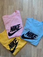 3 T Shirt s Gelb und rosa und hellblau mit Zeichen Gr.L Dresden - Leuben Vorschau