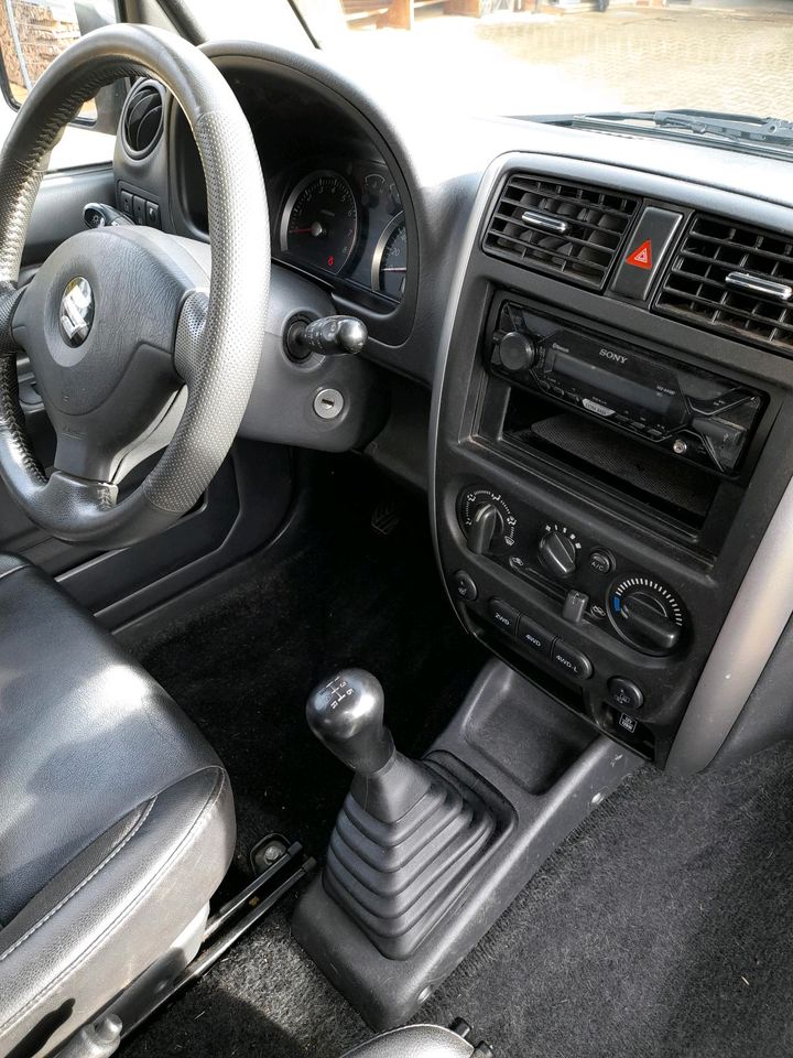 Suzuki Jimny 1.3 4 WD Style Straßenfahrzeug in Floß