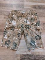 Hose / Shorts beige mit Blumendruck Gr. 36 Niedersachsen - Uslar Vorschau