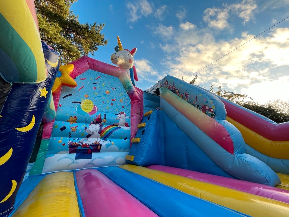 Hüpfburg Einhorn mit Rutsche zum mieten Geburtstag Party Events in Oberhausen